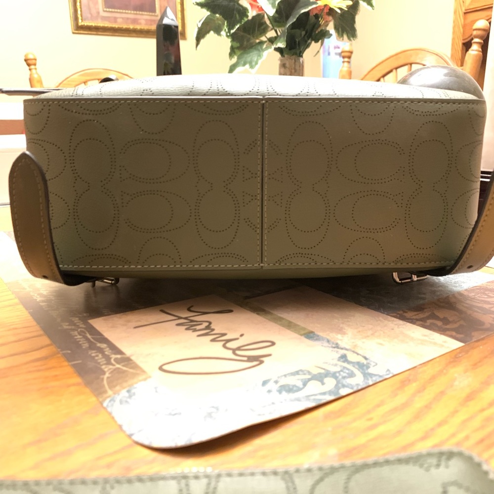 NWT olive green coach backpack with matching wristlet. Backpack is 11”x10”x4”. - Picture 7 of 10